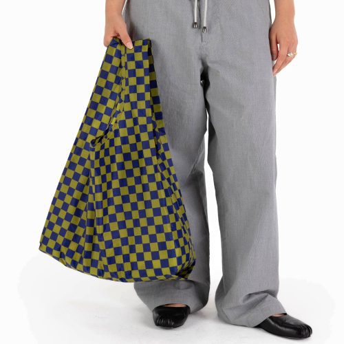 baggu pear navy check standard ripstop nylon reusable tote bag in models hand