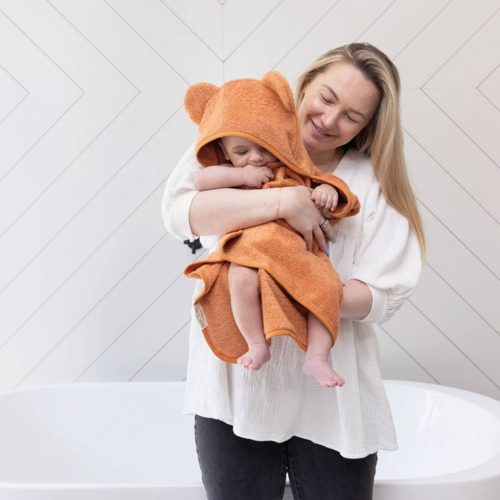 bella tunno GLCTS03 baby hooded towel and wash mitt set in pumpkin on baby