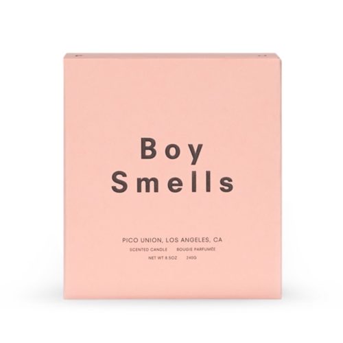 boy smells woodphoria scented coconut beeswax blend candle in matte pink box packaging