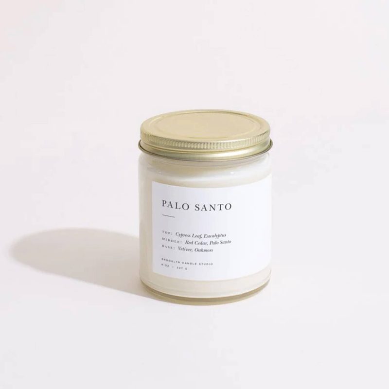 brooklyn candle studio palo santo scented soy wax candle in minimalist jar with gold lid