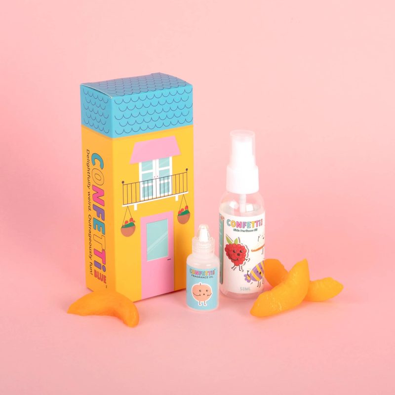 confetti blue sweet peach mini perfume making kit packaging with contents and peaches