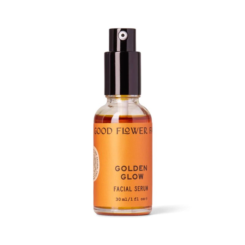 good flower farm golden glow facial serum in glass bottle with orange label