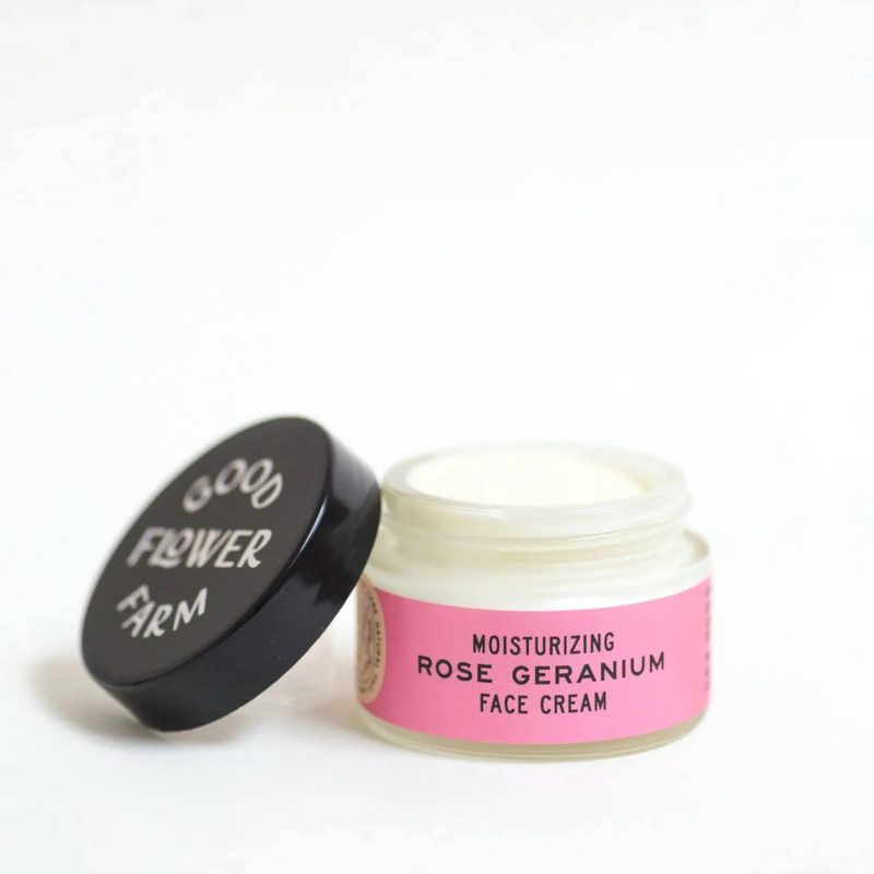 good flower farm moisturizing rose geranium face cream in glass jar lid off