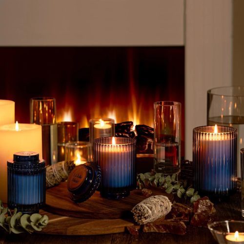 la jolie muse amelie eucalyptus alpine sage scented soy wax candles in ribbed blue glass vessels with lids in 3 sizes