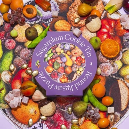 piecework puzzles 750 piece sugarplum cookie tin holiday christmas round jigsaw puzzle lifestyle