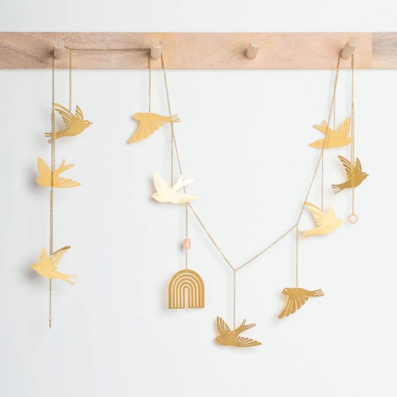 scout curated wears GA002 bird hanging garland brass sunstone hanging on wood pegs