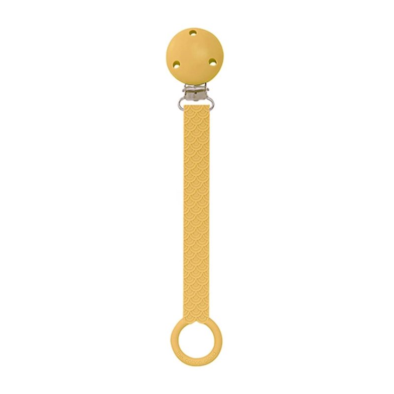 the cotton cloud scallop pacifier holder in golden toffee